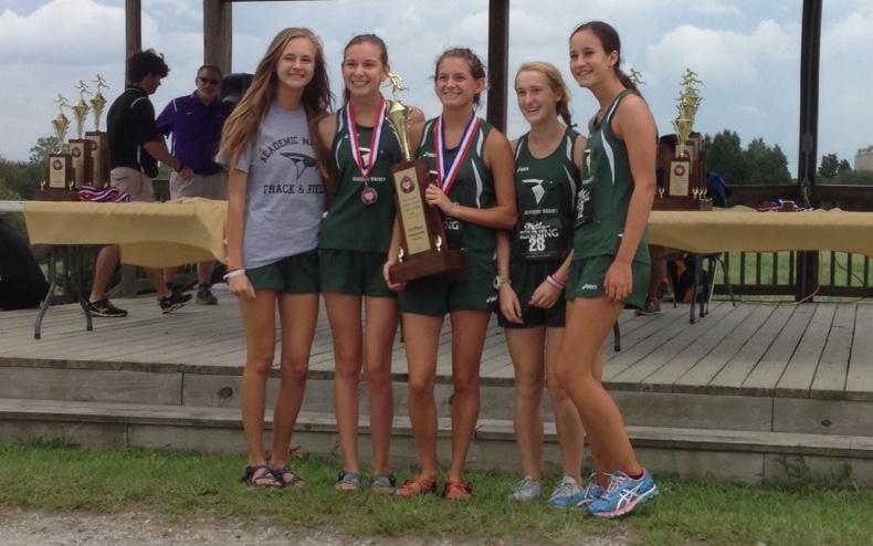 Varsity girls team holding 1st place trophy, from left to right: Caroline Seymour, Annalise Hafner, Kate Kuisel, Rachel Walmet, and Carly Hall