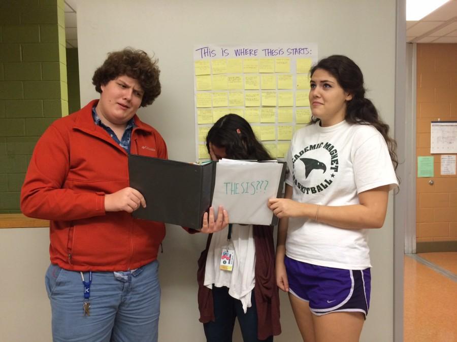 Juniors Liam Rowley, Ellie Moore, and English Laserna cry about thesis. 