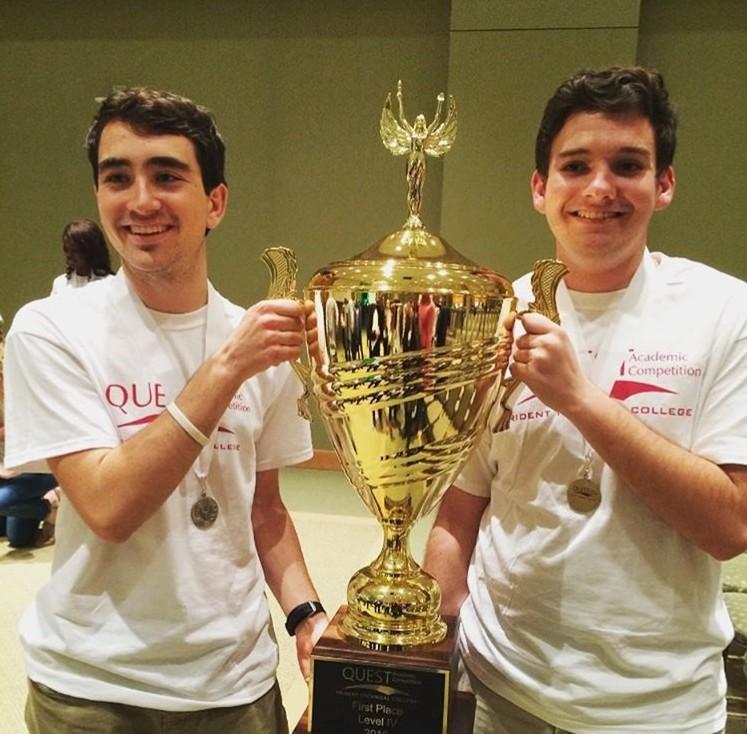 Seniors Peter Sterckx and Jameson Sanders hold the trophy for Level IV 1st place overall