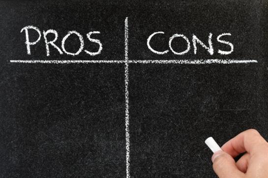 Blackboard list of pros and cons, for and against argument concept