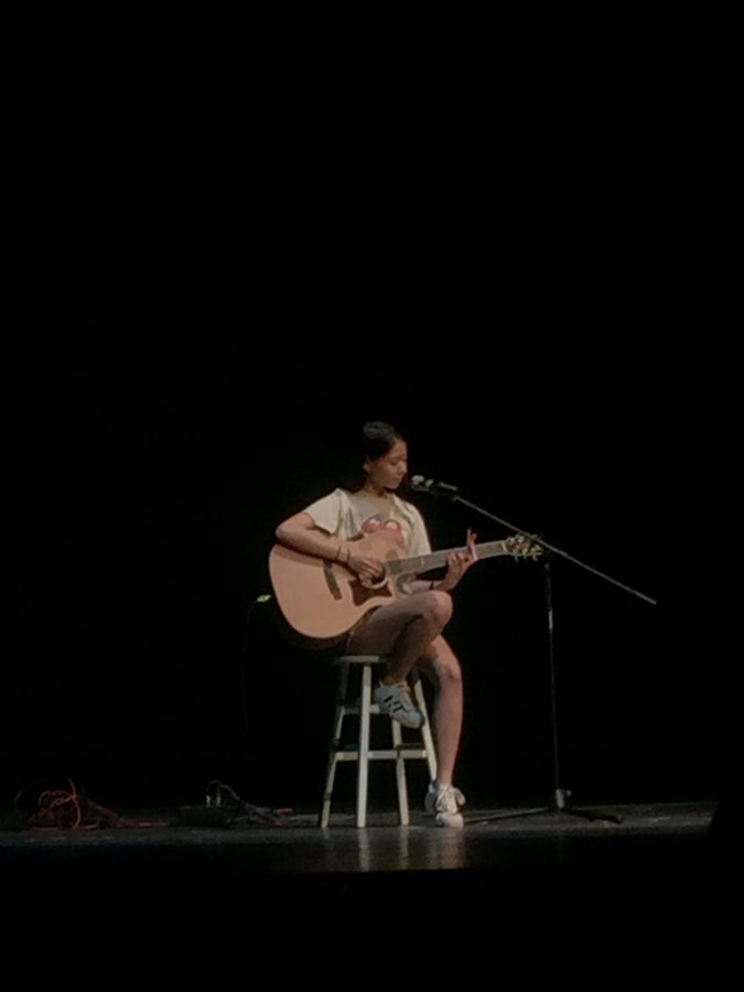 Isabelle Liu (junior) plays and sings The Man on the guitar 3RD PLACE