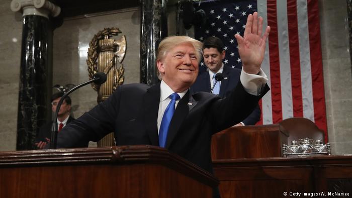 Trump waves to supporters in Congress during State of the Union Address