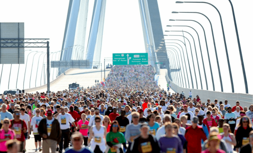 The Cooper River Bridge Run brings thousands of runners to Charleston every year.