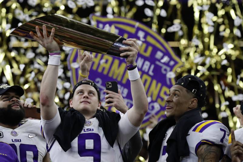 the LSU Tigers celebrate their National Championship (photo courtesy of the Associated Press)