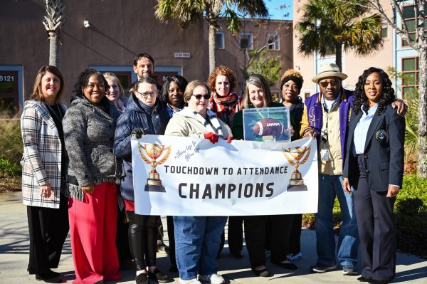 The AMHS administration celebrates their success!