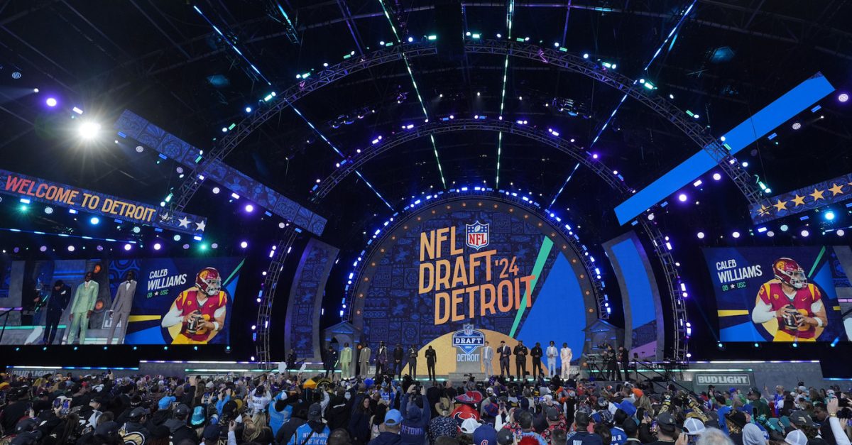 Top draft prospects stand on stage during the first round of the NFL football draft, Thursday, April 25, 2024, in Detroit. (AP Photo/Paul Sancya)